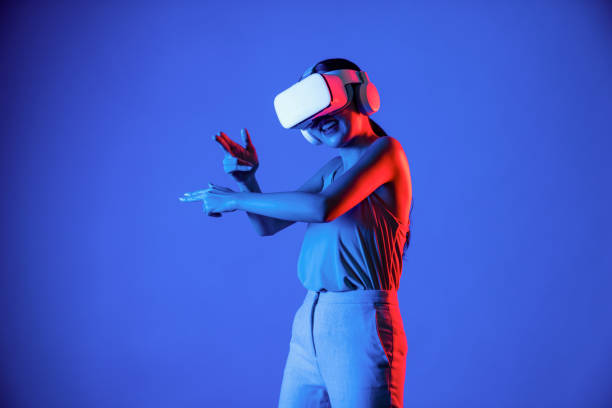 istock Elegant woman connect metaverse seriously playing shooting games. Hallucination. 2159707184