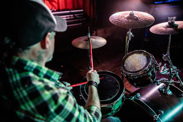 istock Mature man playing drum kit on a live concert 2159707348