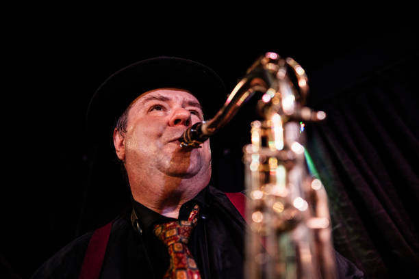 istock Senior man playing saxophone on a live concert 2159707525
