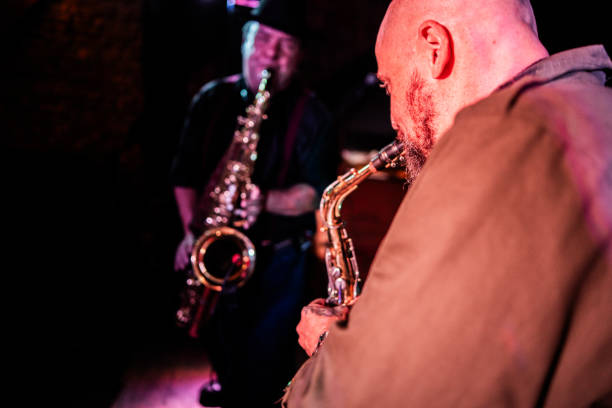 istock Musicians playing saxophone at nightclub 2159707908