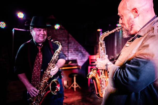 istock Musicians playing saxophone at nightclub 2159707967