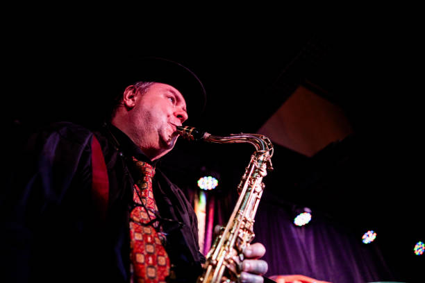istock Senior man playing saxophone on a live concert 2159708637