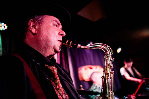 istock Senior man playing saxophone on a live concert 2159708641