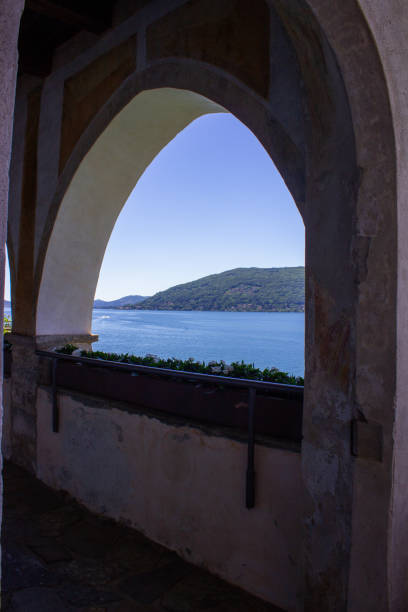 istock Lake Maggiore view from a medieval arch 2159708712