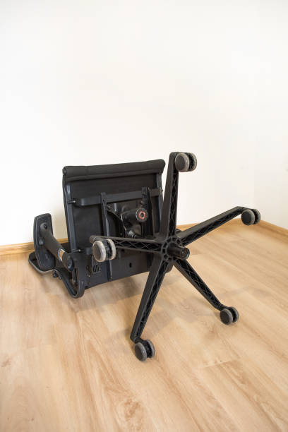 Bottom of Ergonomic Adjustable office chair. Knocks over chair