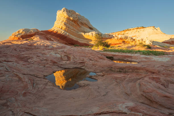 istock White Pocket national monument with reflection pond 2159717644