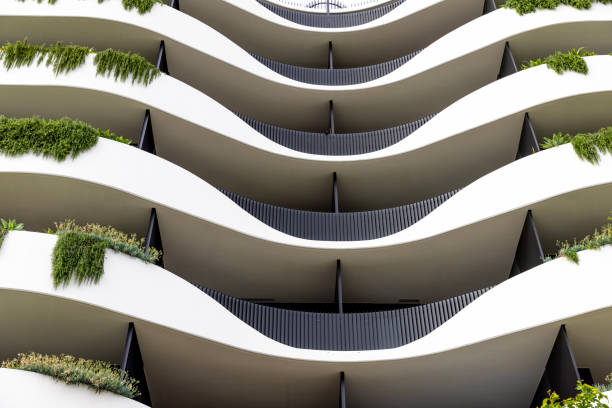 istock Closeup front view of new, modern apartment building, background with copy space 2159717948