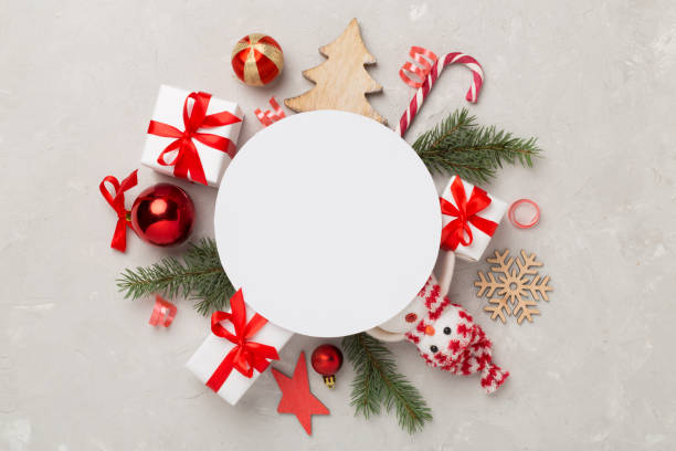 istock Greeting card mockup with christmas decor on concrete background, top view 2159719122