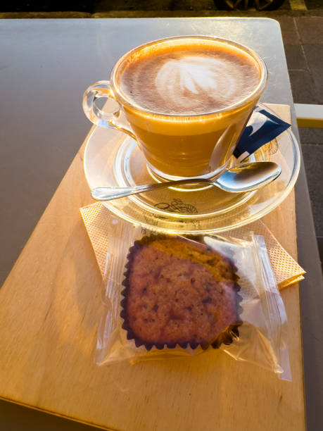 istock Morning Delight: Coffee and a Muffin Outdoors 2159725299