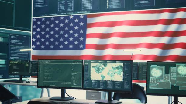 istock Governmental tech room showing an USA flag on big screen 2159726956