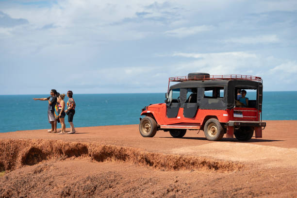 istock Tourists with buggy on the beach 2159729536