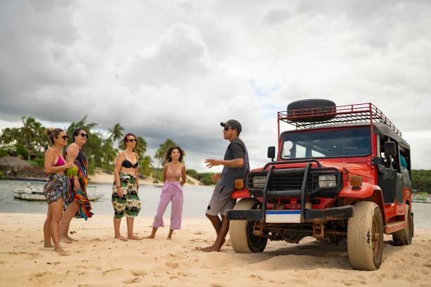istock Tourist guide talking to tourists 2159729571