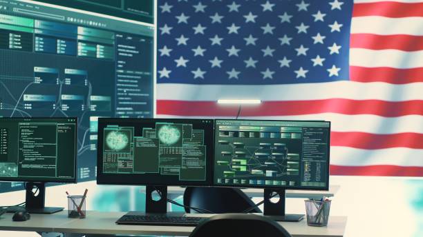 istock Empty digital operations room with an american flag running on big screen 2159729627