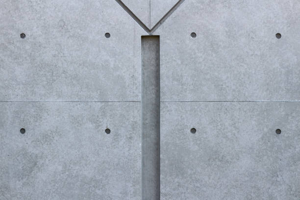 istock Photo of a concrete wall with an abstract design as background material 2159731152