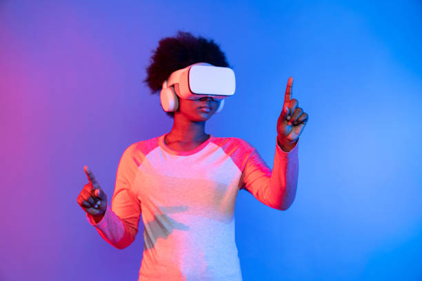 istock Young African wearing VR through meta select 3D hologram data app. Contrivance. 2159733084