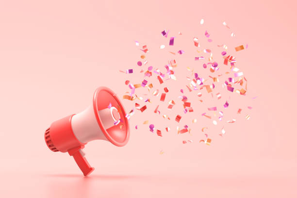 istock Red megaphone with shiny confetti coming out of it 2159733660