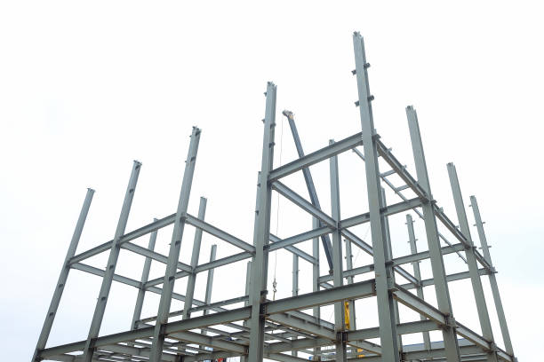 istock Construction of a metal frame. Metal construction covered protective gray primer. 2159734069