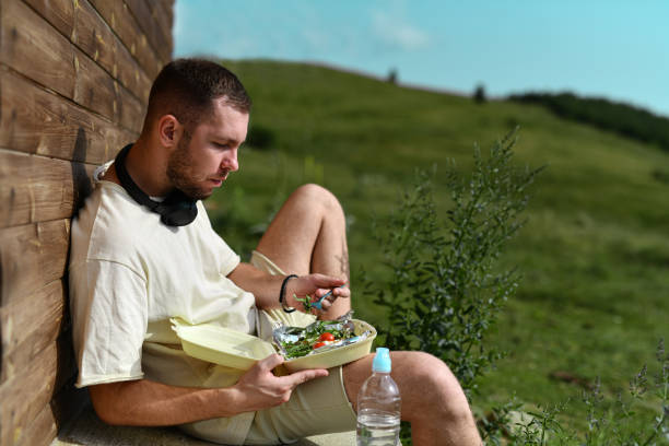 istock Calm Male Enjoying Fresh Vegetables In Salad 2159735845