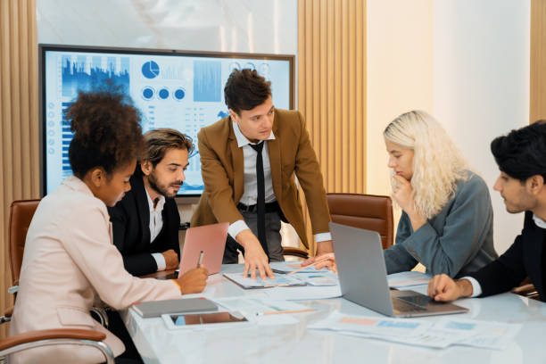 istock Professional smart business team discussion about start up project. Ornamented. 2159737170