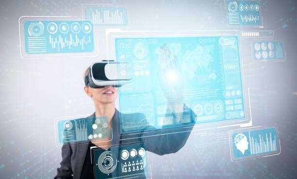 istock Business woman pointing at financial data while wearing VR glasses. Contraption. 2159737626