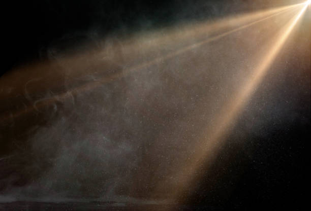 istock spotlight on stage or gods rays isolated on black background 2159739738
