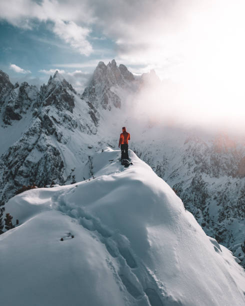 istock Hiker at a scenic viewpoint overlooking the Dolomites, Cadini di Misurina 2159741292