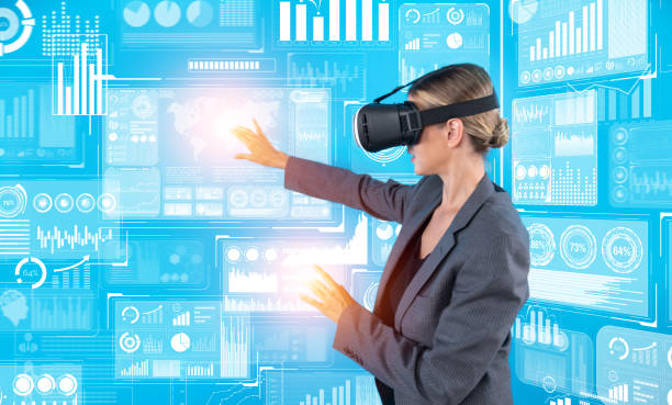 istock Businesswoman using VR goggle to look at financial data analysis. Contraption. 2159741621