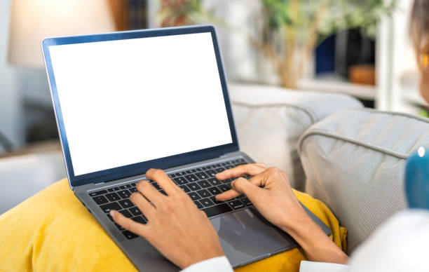 istock Human working with modern laptop computer blank white desktop screen for advertising, mockup, technology, advertising, search information, creative design on table 2159745229
