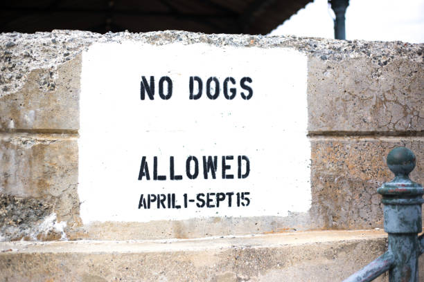 Sign Reading: No Dogs Allowed April 1-Sept 15