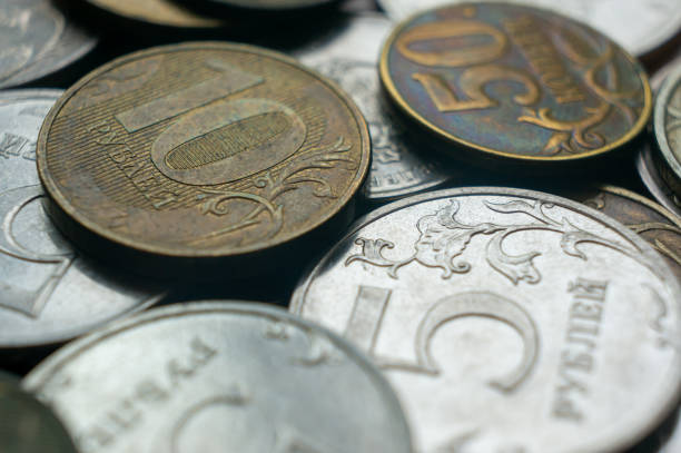 Russian currency, coins lie on the surface close-up. High quality photo