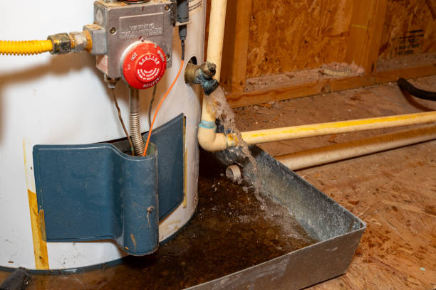 istock Water gushing out of water heater drain 2159757444