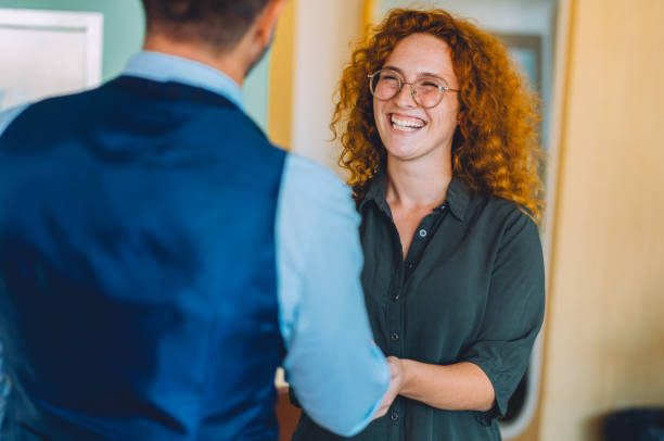 istock Business colleagues talking in the office 2159763424