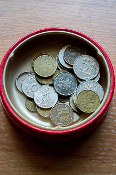 Russian currency, coins lie in a cup. High quality photo