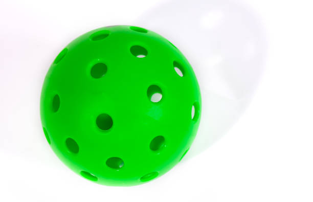 istock A dark green pickleball ball isolated on a white background 2159763965