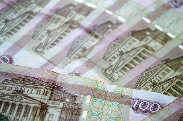 Russian currency, banknotes lie on a wooden surface. High quality photo