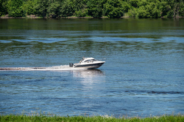 istock Motor boat goes fast on water. 2159774984