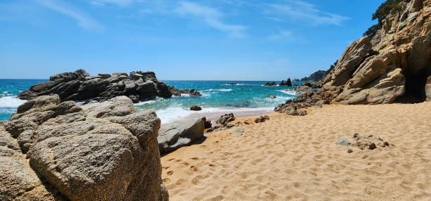 istock Seascape with waves and rocks. Mediterranean coast on a sunny windy day. 2159786737