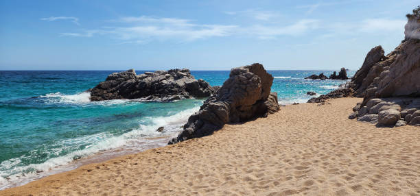 istock Seascape with waves and rocks. Mediterranean coast on a sunny windy day. 2159786750