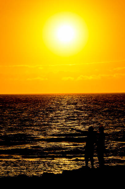 istock The Sun Setting in the Sea 2159792088