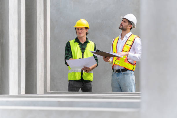 istock Site manager and worker on construction site, Engineer man and foreman team inspect the construction site 2159795654