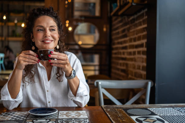 istock Her Instant Oasis - Businesswoman Enjoys Cafeteria Break 2159795914
