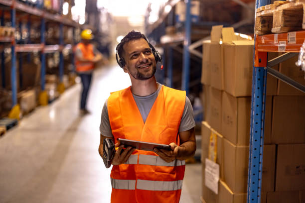 istock Portrait of smiling warehouse worker 2159806402