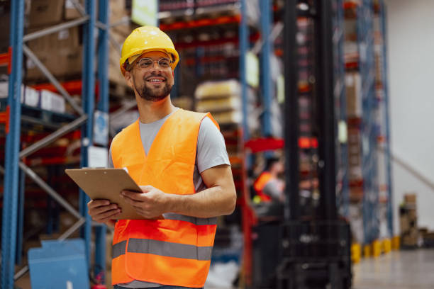 istock Portrait of smiling warehouse worker 2159806529