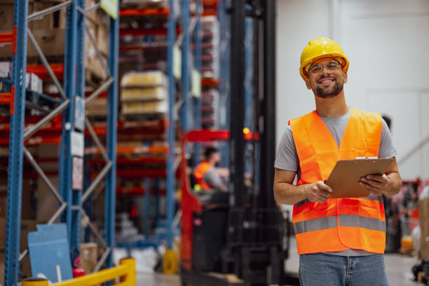 istock Portrait of smiling warehouse worker 2159806775