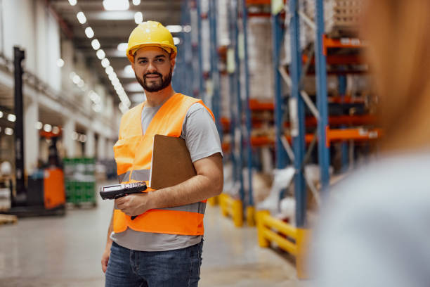 istock Portrait of smiling warehouse worker 2159807352