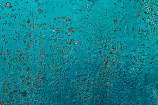 istock Metal texture covered with old blue paint with scratches and wear 2159808715