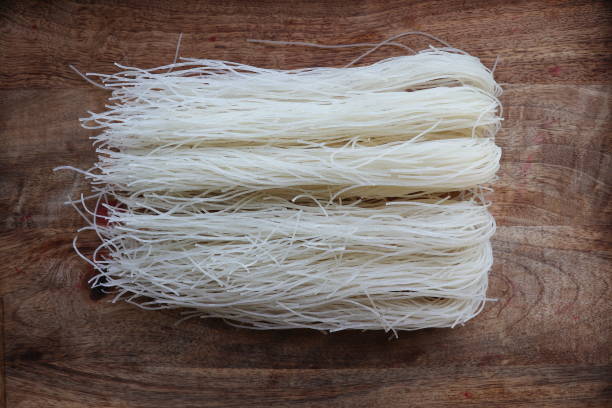 istock Thai died Rice Vermicelli on wood board,Uncooked 2159809740