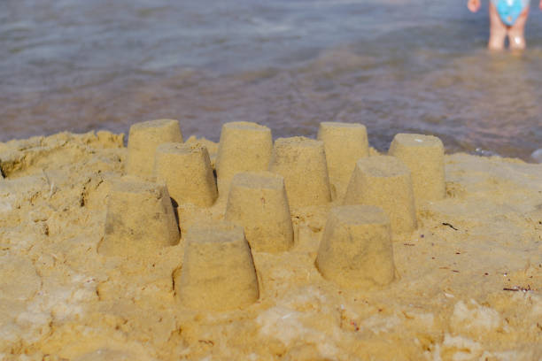Playing with sand stock photo