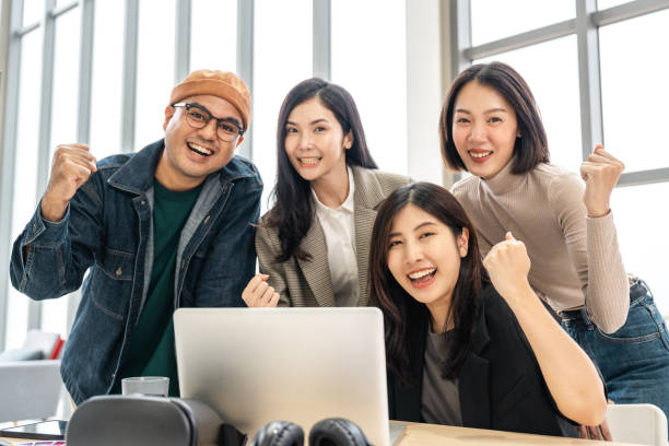 istock Asian business start up freelance people team analyzing statistics financial. Group Team of businesspeople man and woman Meeting Conference Discussion various topic Corporate Concept in office. 2159812195