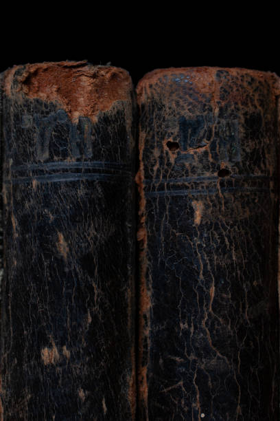 istock Old vintage books on black background 2159812965